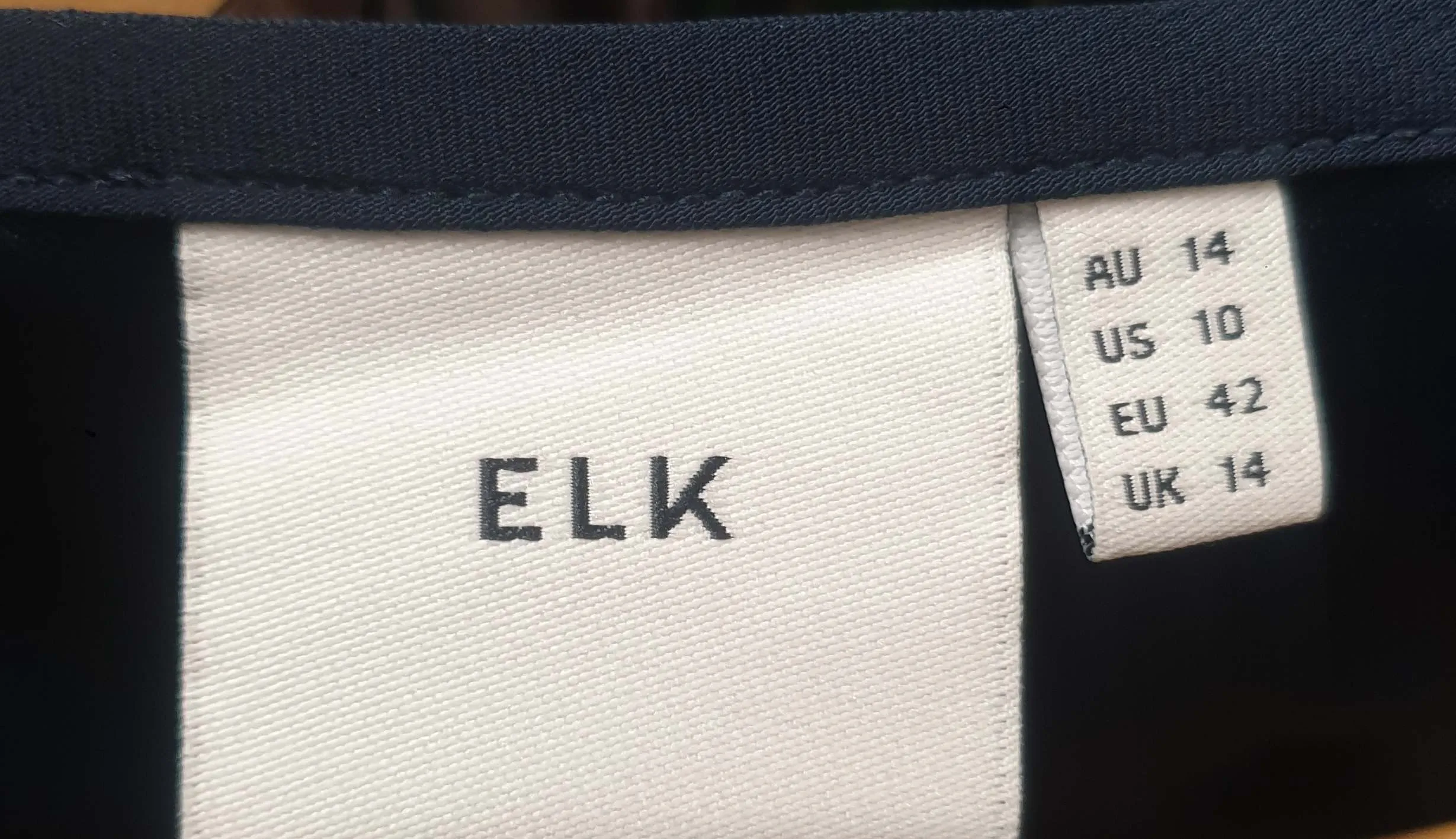 Elk black top with gold asymmetrical dot print size 14